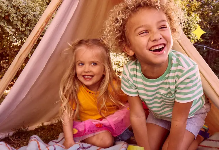 kids playing in tent